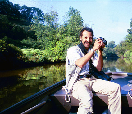 cliff McGill on the 3r2n Boat photographing the river