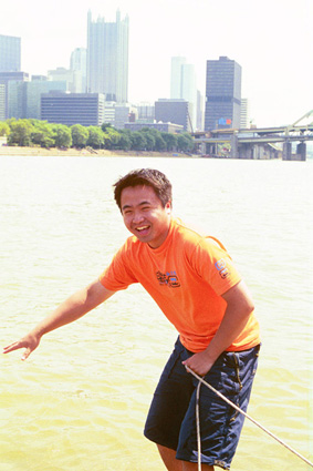 Hsi Alex Shen surfing Pittsburgh's rivers