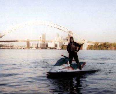 Jennifer Brodt on a jet ski in the river