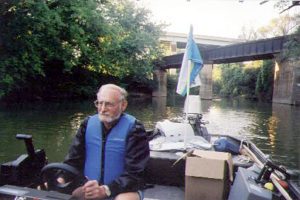 joel tarr on the 3r2n boat on the river