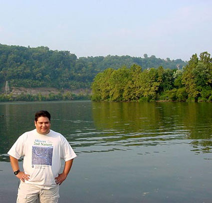 Rene Serrano in front of a river
